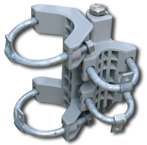 A universal self-closing spring hinge with 2 small u-bolts and 2 large u-bolts